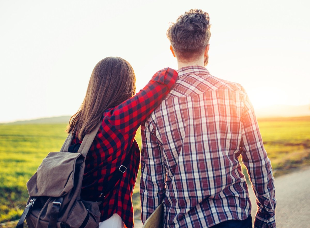 Couple wearing flannel shirts