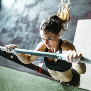 Woman exercising with chin-ups