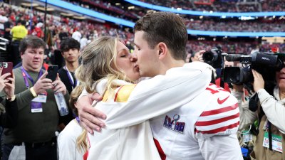 Brock Purdy embrasse sa fiancée Jenna Brandt avant le Super Bowl 2024