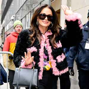 Feature Kyle Richards Channels Her Inner French Girl in Black and Pink Cropped Shearling Jacket