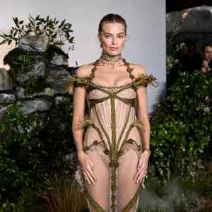 : Margot Robbie’s Show-Stopping Red Carpet Style Includes Naked Dresses, Bejeweled Looks and More