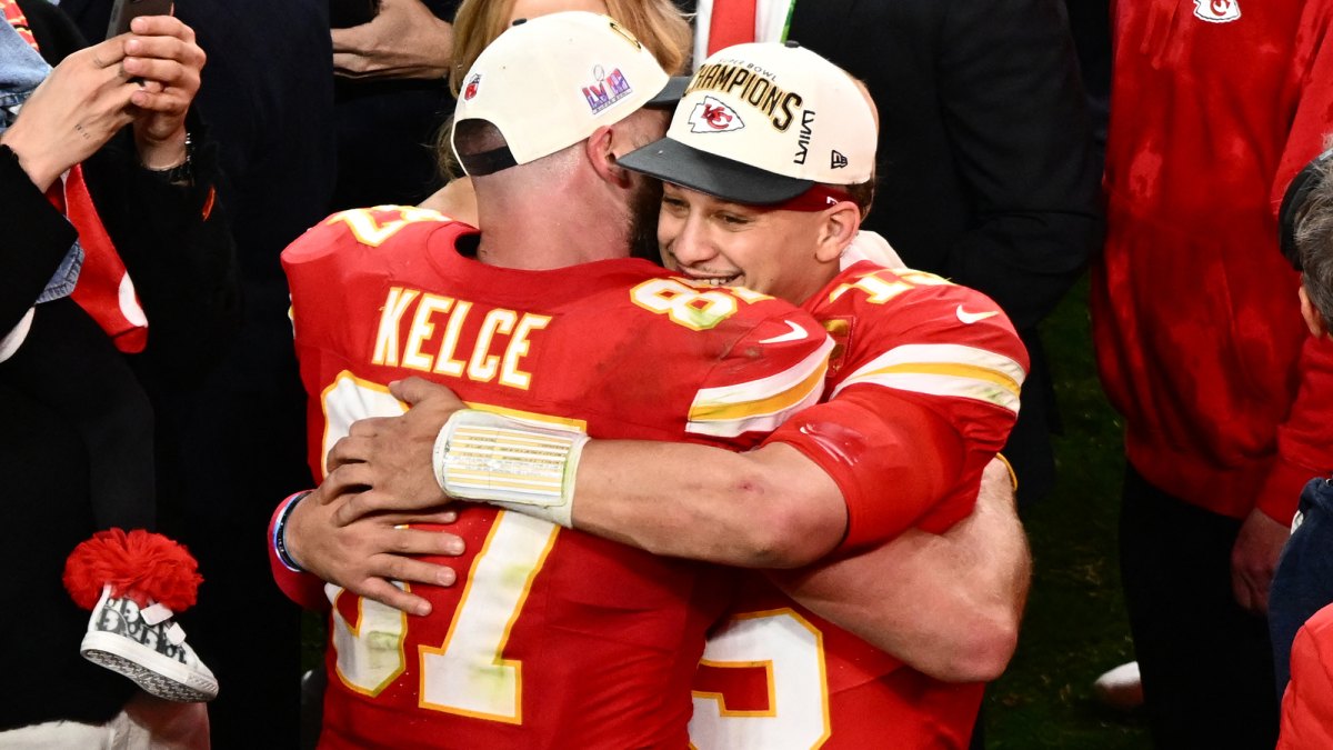 Kansas City Chiefs' tight end #87 Travis Kelce and Kansas City Chiefs' quarterback #15 Patrick Mahomes hug after winning Super Bowl LVIII against the San Francisco 49ers at Allegiant Stadium in Las Vegas, Nevada, February 11, 2024. (Photo by Patrick T. Fallon / AFP) (Photo by PATRICK T. FALLON/AFP via Getty Images)