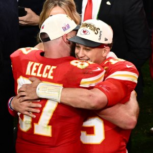 Kansas City Chiefs' tight end #87 Travis Kelce and Kansas City Chiefs' quarterback #15 Patrick Mahomes hug after winning Super Bowl LVIII against the San Francisco 49ers at Allegiant Stadium in Las Vegas, Nevada, February 11, 2024. (Photo by Patrick T. Fallon / AFP) (Photo by PATRICK T. FALLON/AFP via Getty Images)
