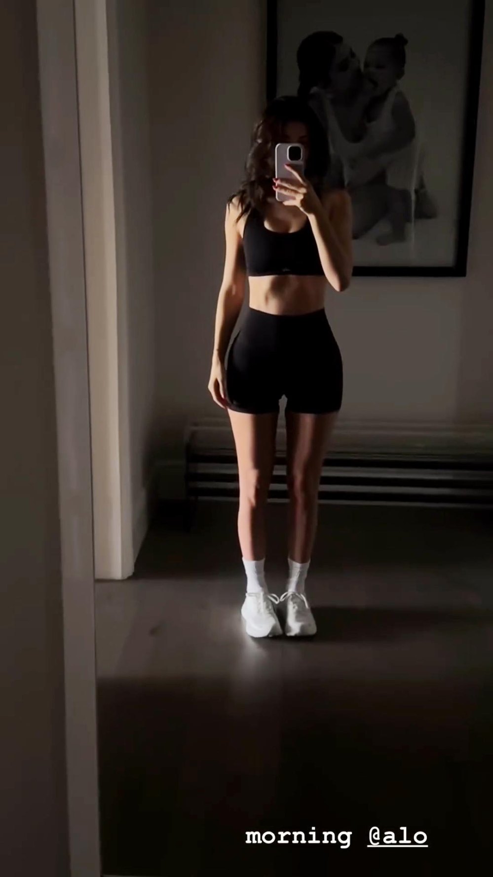 Kendall Jenner shows off her tiny figure in sports bra and