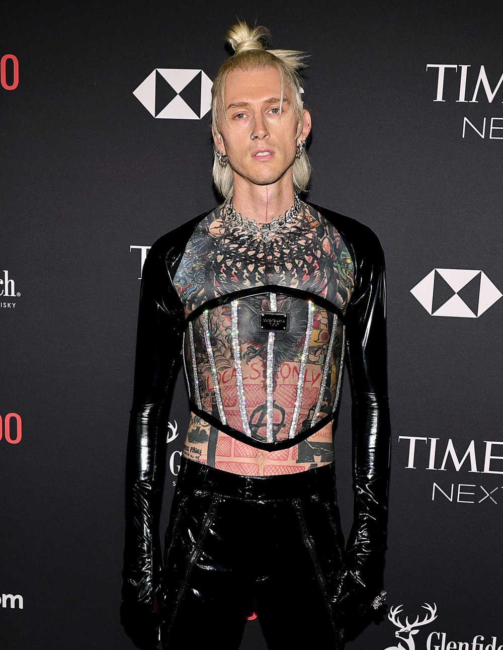 Machine Gun Kelly Covered Up His Tattoos In Strikingly Dramatic Fashion With Help of Renowned Visual Artist 719