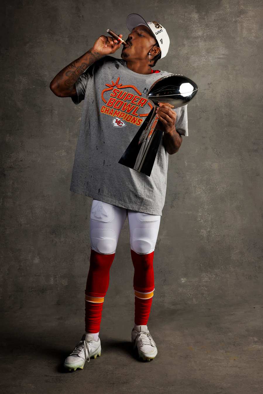 Mecole Hardman Jr Kansas City Chiefs Players Kiss Vince Lombardi Trophy in Super Bowl LVIII Winners Portraits
