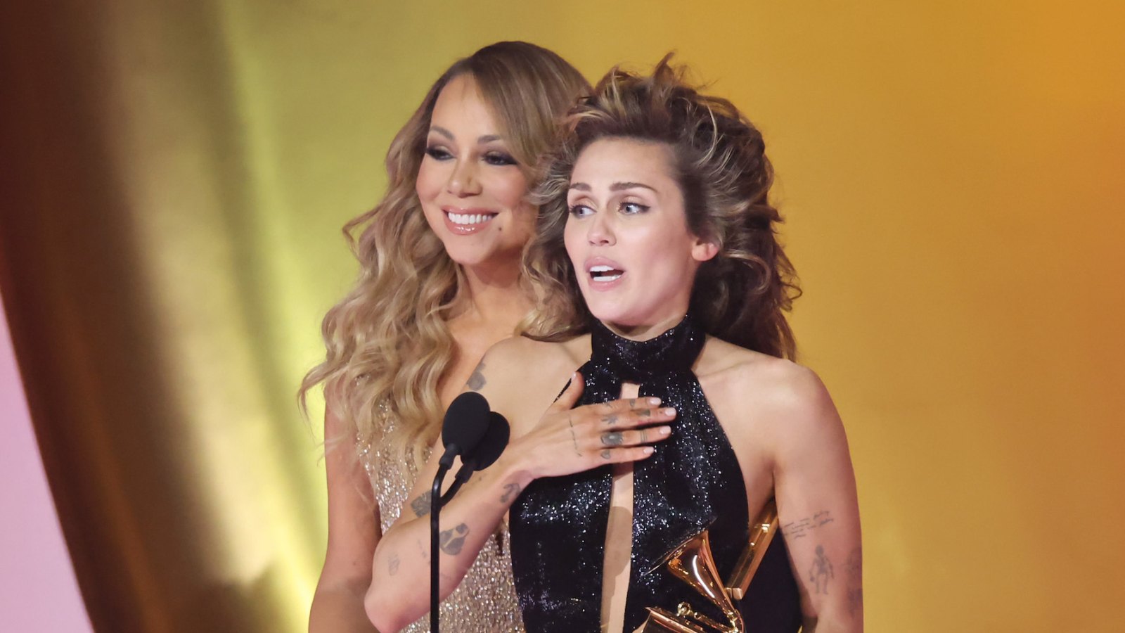 Miley Cyrus Is in Total Awe of Mariah Carey While Receiving Her 1st Grammy Award