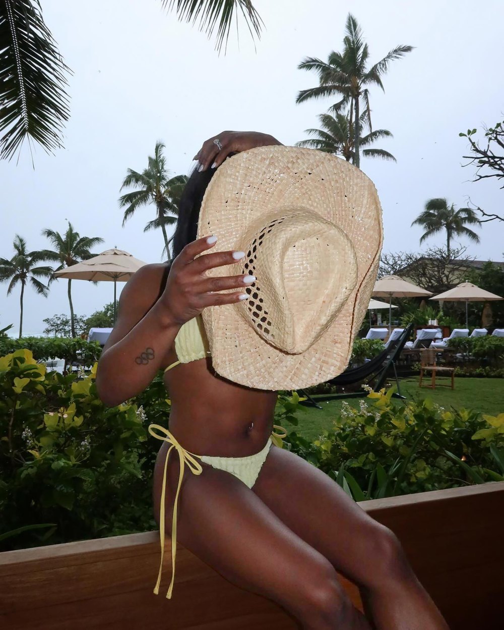 Simone Biles Channels Western Style in Yellow Bikini and Cowboy Hat While On Vacation With Husband