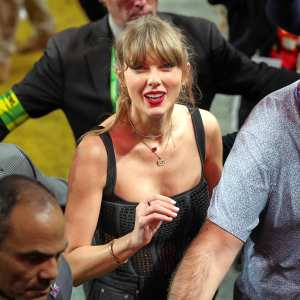 Taylor Swift Gives a Sweet Nod to Travis Kelce With ‘87’ Boots and Bejeweled Football Purse