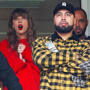 Taylor Swift Seemingly Encourages Travis Kelces Pal Ross Travis to Feed Lion at Sydney Zoo