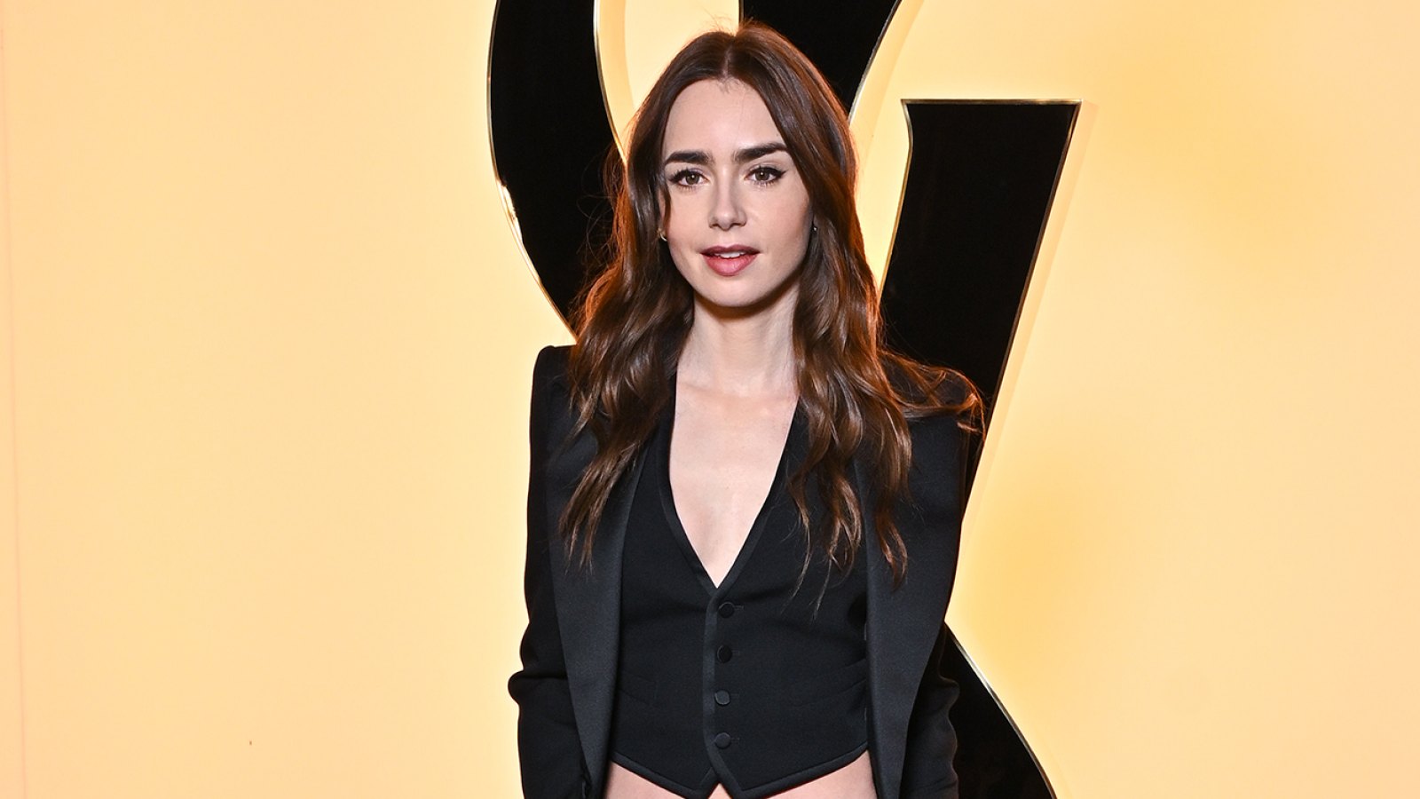 Lily Collins at the Saint Laurent show during Paris Fashion Week on February 27, 2024.