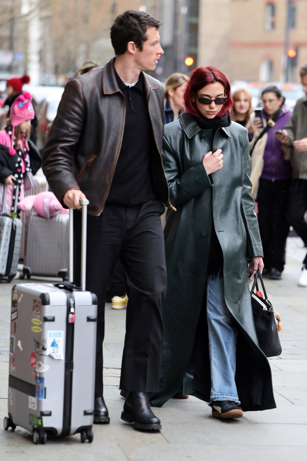 Dua Lipa and Boyfriend Callum Turner Travel Together in Style in Coordinated Leather Jackets