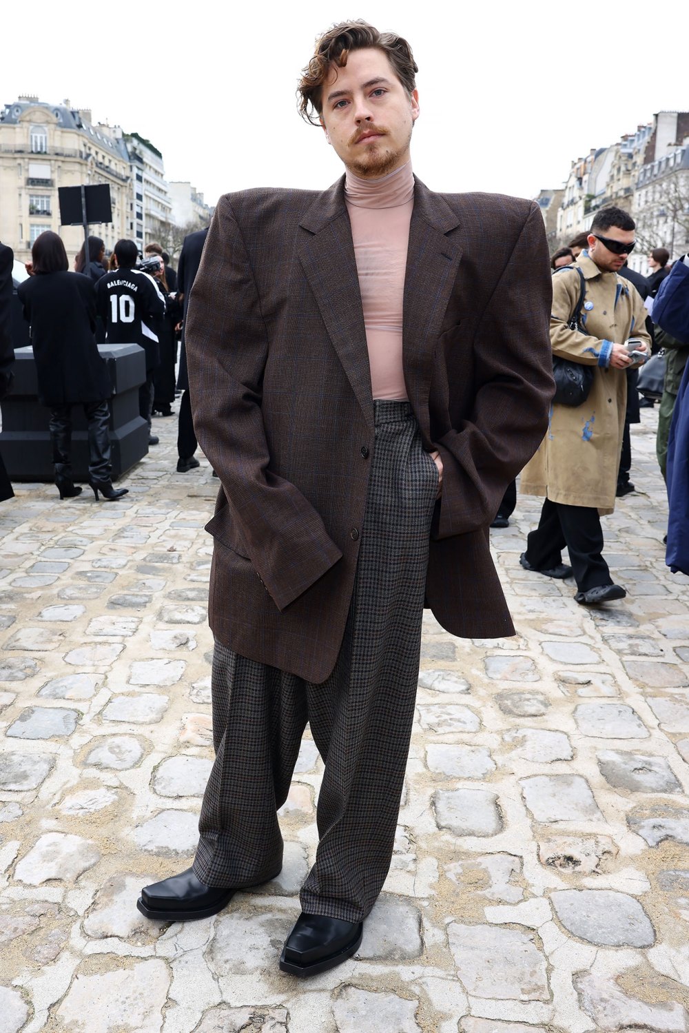 Feature Cole Sprouse Channels the 80s in Oversized Blazer and Shoulder Pads at Paris Fashion Week