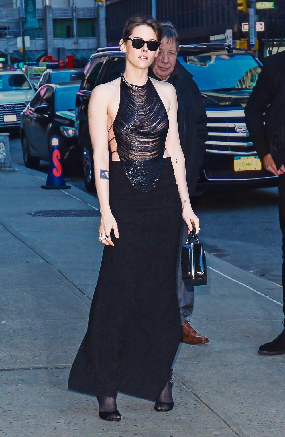Kristen Stewart Goes Monochrome in Black Cut-Out Halter Top and Maxi Skirt in NYC