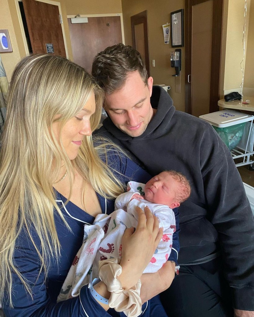 Callie Gullickson and Chris Howell with their newborn son