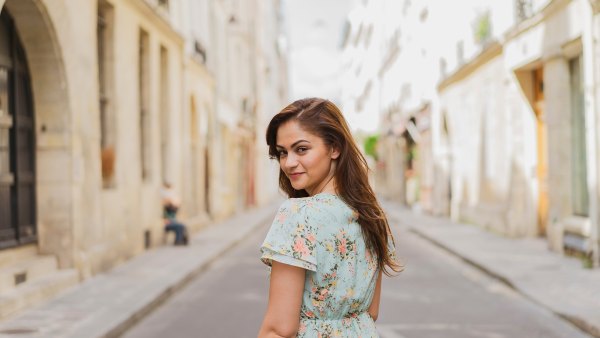Smiling woman standing on street