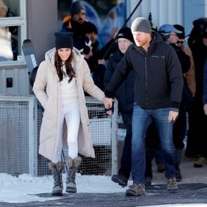 Meghan Markle wearing Frame jeans alongside Prince Harry.