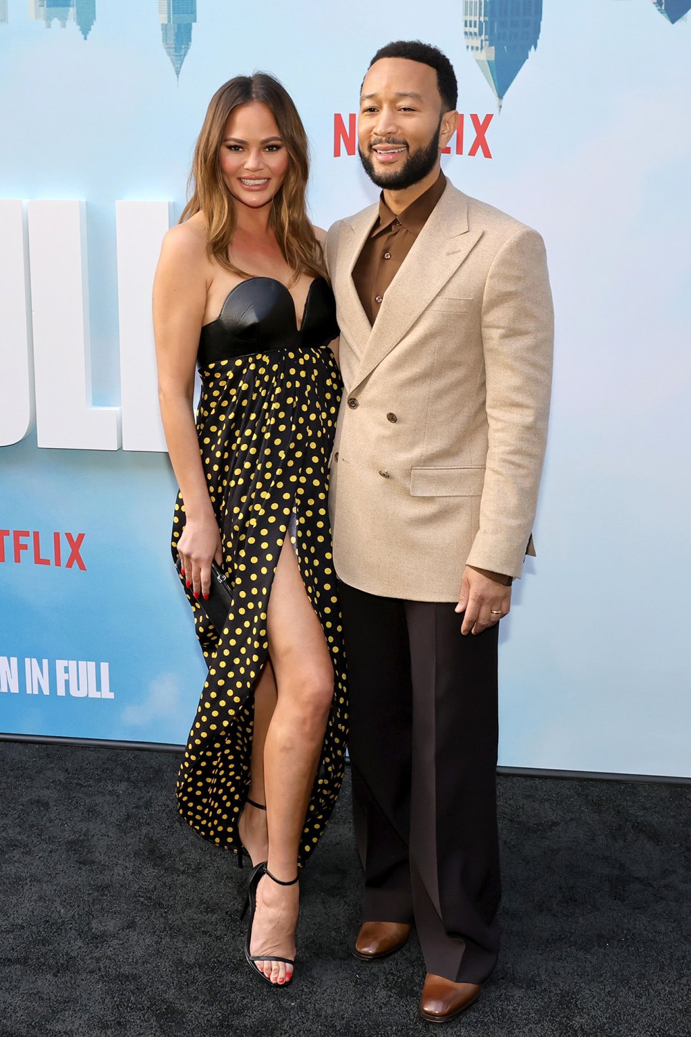Chrissy Teigen in $5K Dress With John Legend at Netflix Premiere