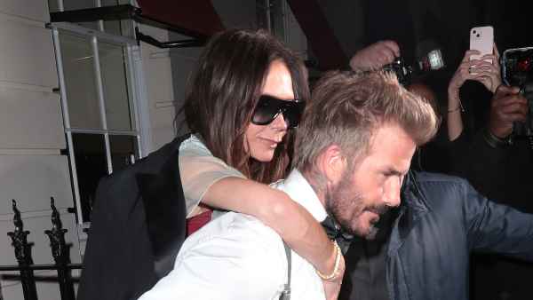 David Beckham Carries Wife Victoria Beckham Out of Her Birthday Party