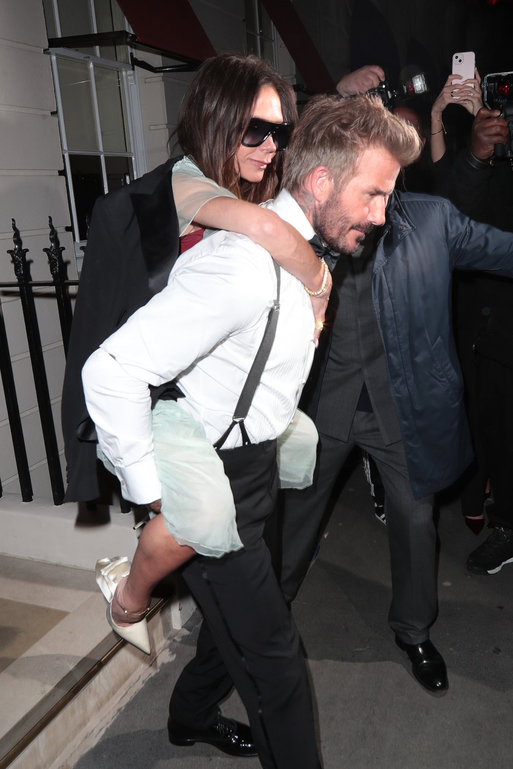 David Beckham Carries Wife Victoria Beckham Out of Her Birthday Party