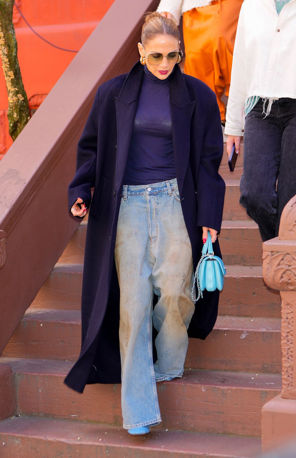 Jennifer Lopez Elevates Baggy Jeans With a Fitted Turtleneck | Us Weekly