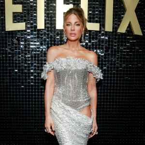 Kate Beckinsale Hints at Health Issues in Tummy Troubles Survivor Shirt