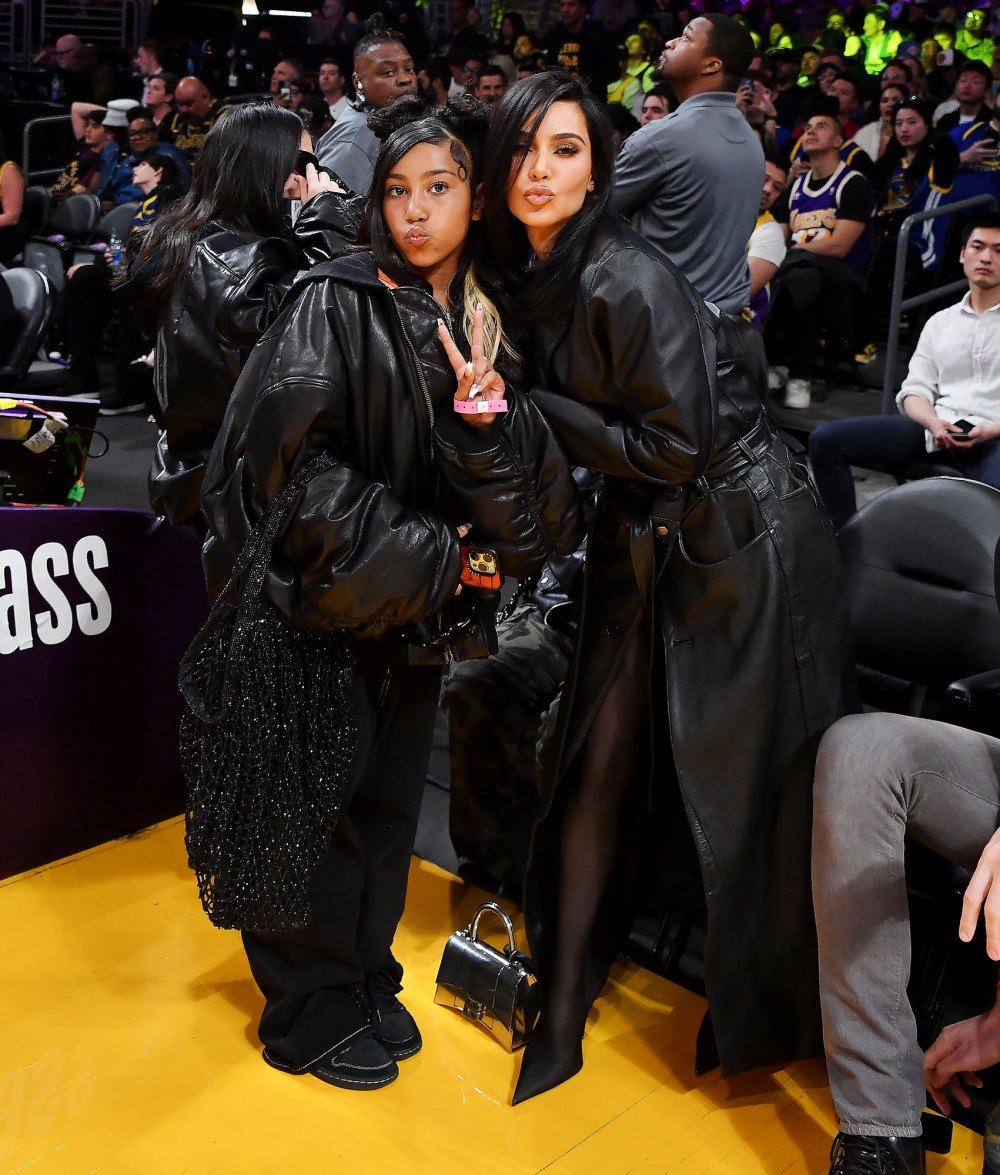 Kim Kardashian and North West Los Angeles Lakers and the Golden State Warriors