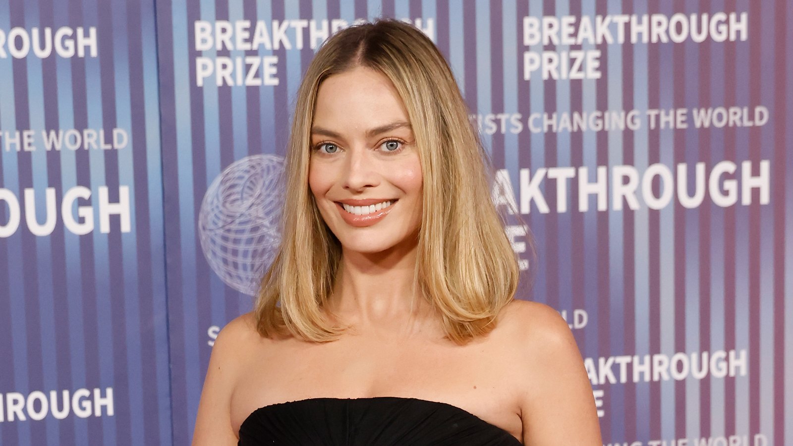 Margot Robbie Looks Angelic in a Yellow Frock As She Serves as a Bridesmaid