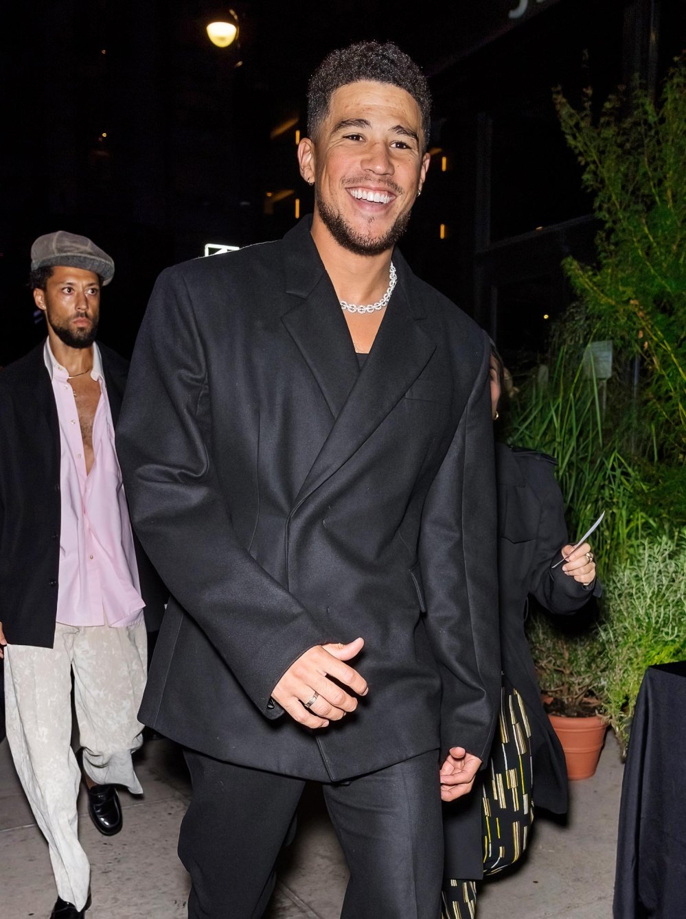 NBA Player Devin Booker Playfully Responds to Fans Who Think He Got a Toupee 422