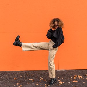 young woman, colorful, casual, silly, dancing, outdoor, city, Zurich, Switzerland