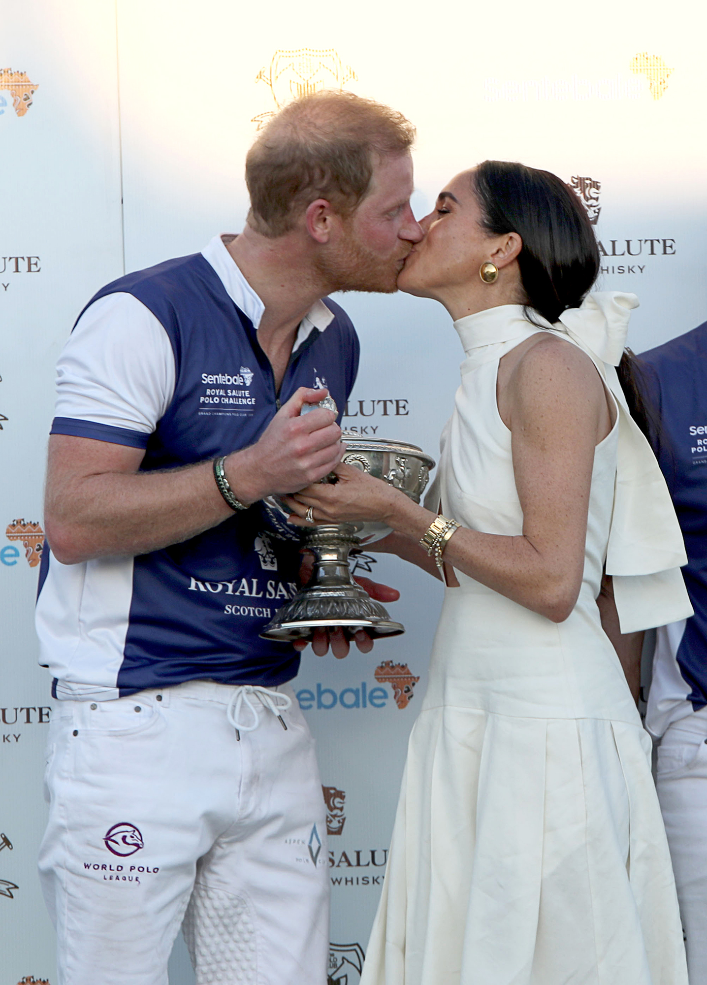 Prince Harry Shares Sweet Kiss With Meghan Markle After Winning Charity Polo Match