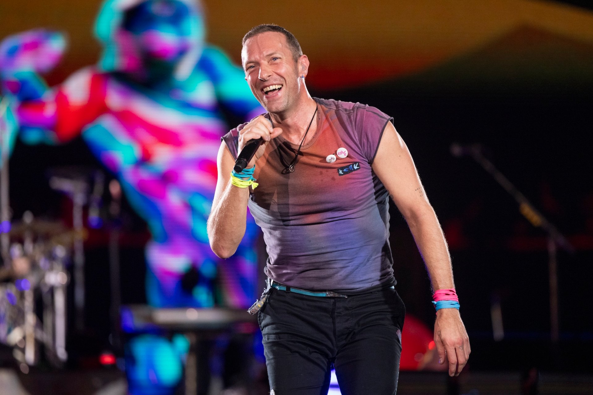 Chris Martin Gives 65-Year-Old Fan a Ride to Coldplay Concert | Us Weekly