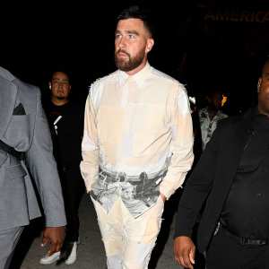 Feature Travis Kelce Attends F1 Miami Grand Prix Party in Patchwork Two-Piece Set and Pink Sneakers