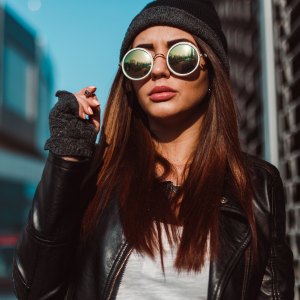 15 Chic Dark Sunglasses That Actually Block Out the Sun
