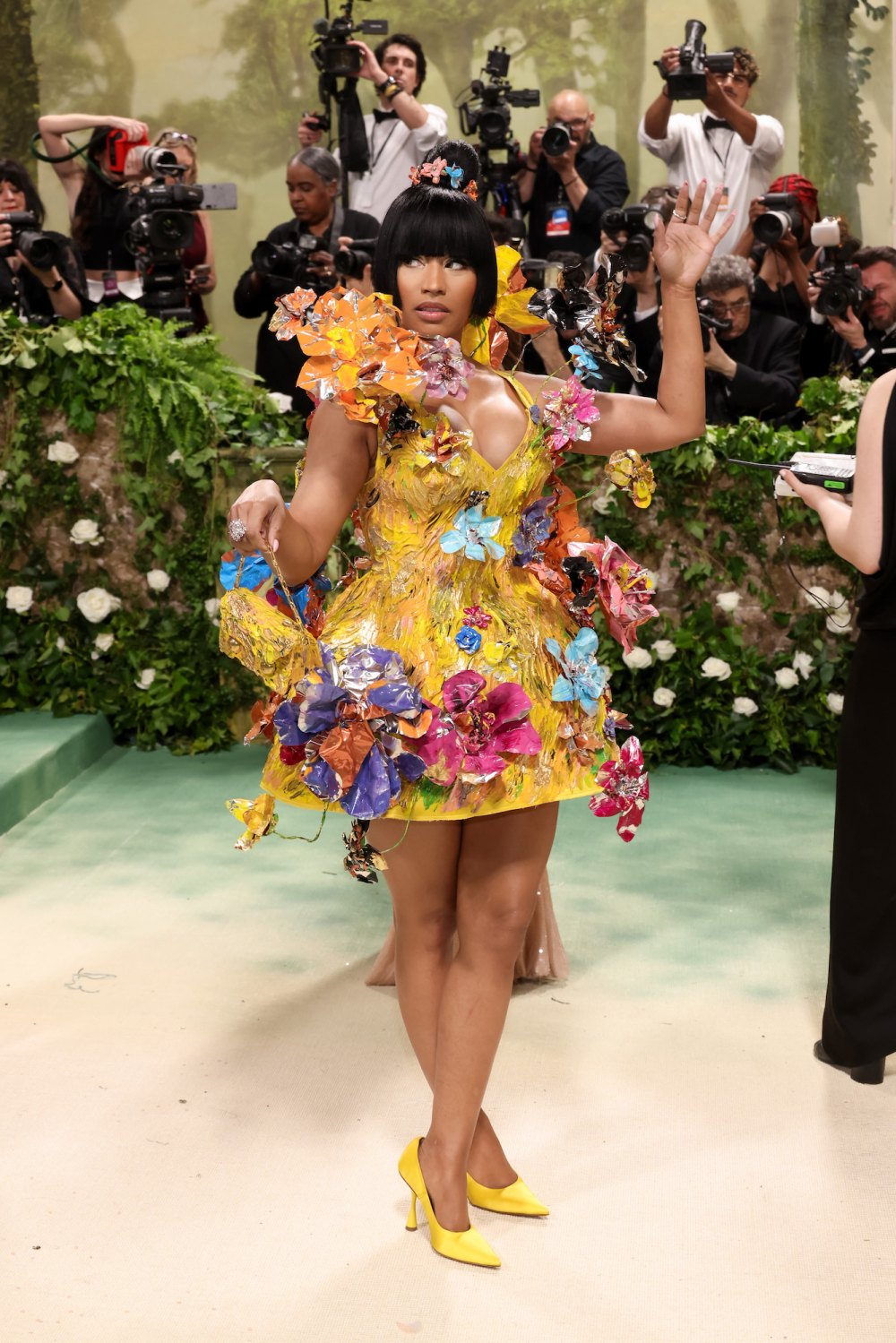 nicki-minaj-wears-bright-yellow-floral-dress-at-2024-met-gala-us-weekly