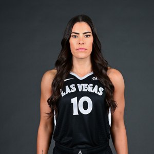 WNBA Star Kelsey Plum Goes Braless in Cropped Leather Vest at Season Opener in Las Vegas