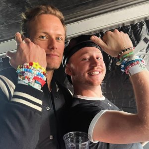 Sam Heughan Compares Taylor Swifts Evermore Live Set to Outlander While Attending With Cast