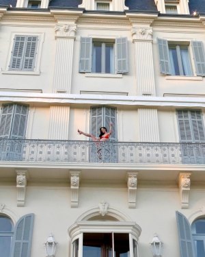 Katy Perry Poses on a Balcony in Tiny Orange Bikini | Us Weekly