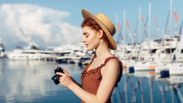 Woman taking pictures at the seaport