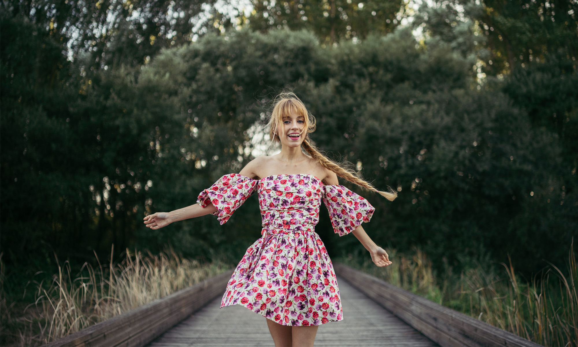 woman wearing floral mini dress