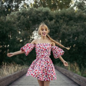 woman wearing floral mini dress