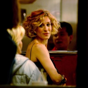 Sarah Jessica Parker as Carrie Bradshaw.