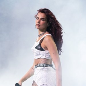 Dua Lipa Wears T Shirt as a Skirt at Glastonbury Festival