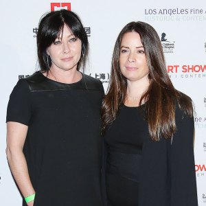 Feature Holly Marie Combs Reacts to News of Charmed Costar Shannen Doherty Death