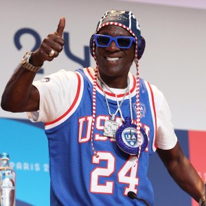 Flavor Flav Is So Appreciative of Fan Support of Womens Water Polo After He Sponsors Team at Olympics