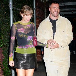 Travis Kelce Seemingly Borrows Taylor Swifts Hat While Attending Eras Concert in Dublin