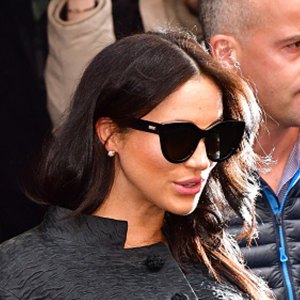Meghan Markle wearing black sunglasses