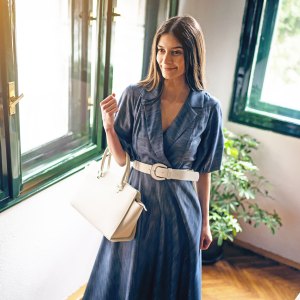 Portrait of confident and modern elegant young businesswoman