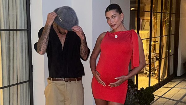Pregnant Hailey Bieber Wows in Red Frock While Cradling Baby Bump With Justin Bieber