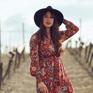 woman wearing floral fall dress